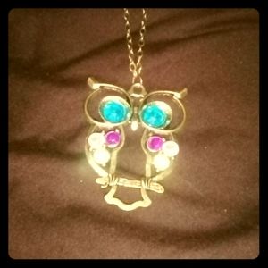 Gold tone owl pendant and long chain